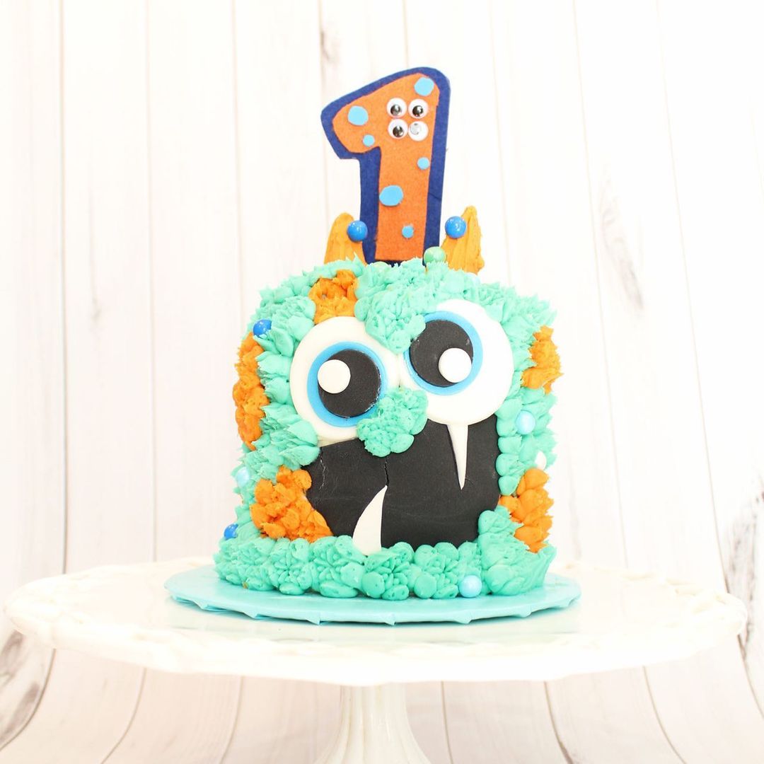 smash cake made to look like a little monster